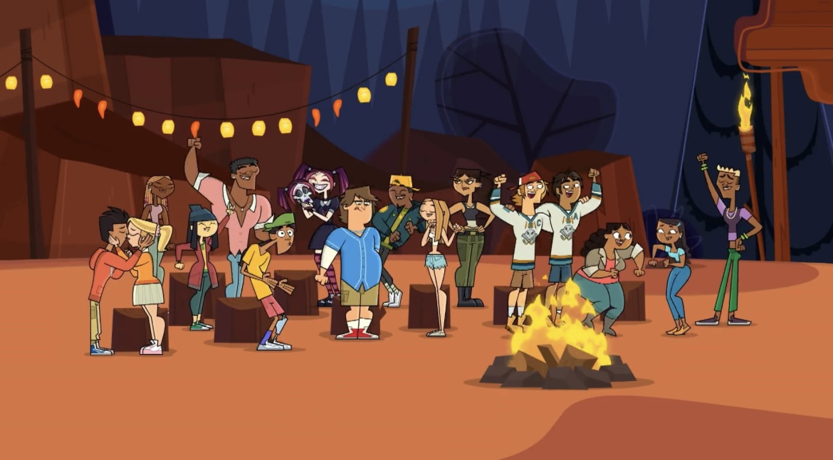 Everyone celebrating and dancing at the bonfire in S7:E13